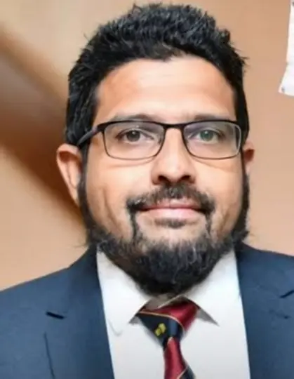 Dr. Mustafa Musajee
